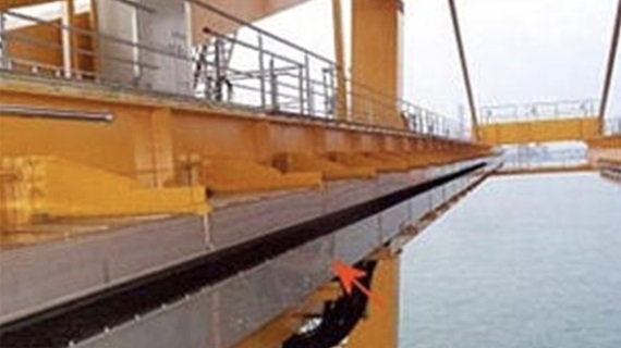 igus® energy chain on a crane, in stainless steel housing 